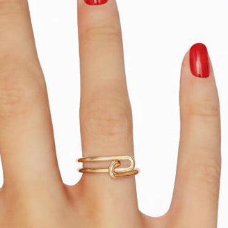 14k solid gold knot double ring - sculptural infinity knot double band, yellow gold on model hand
