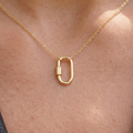 14k solid gold oval carabiner charm holder in yellow gold, screw clasp necklace connector, on white background
