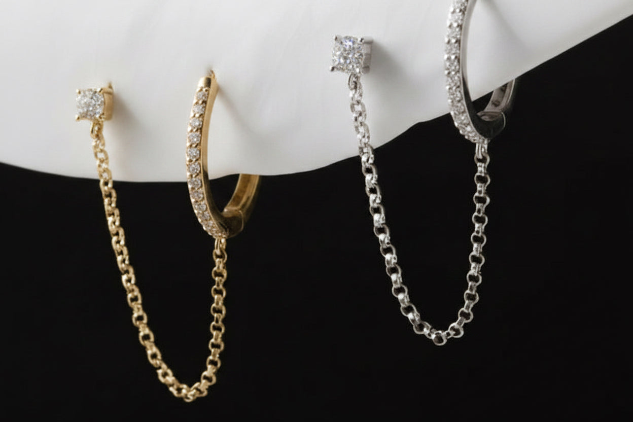 14K solid gold diamond double piercing chain earring — styled ear stack
