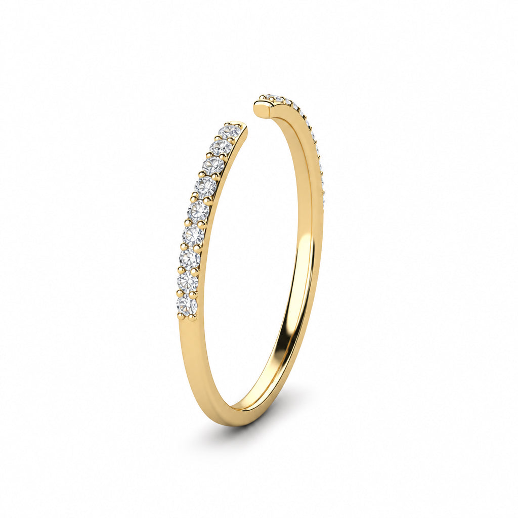 Side angle of a yellow gold white pavé diamond open stack ring, showing the slim band and diamond settings.
