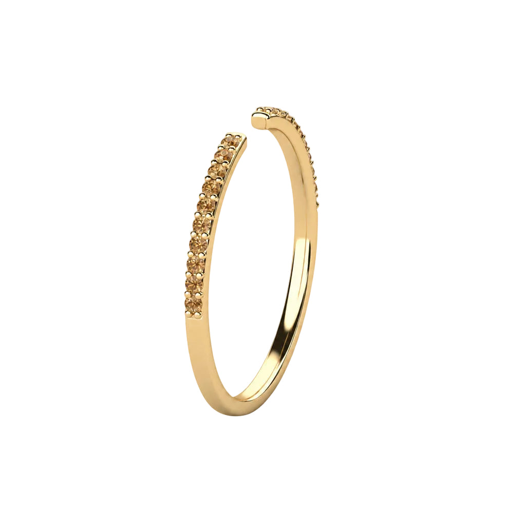 Yellow gold champagne pavé diamond open stack ring, angle view showing the open band and diamond-set shoulders.
