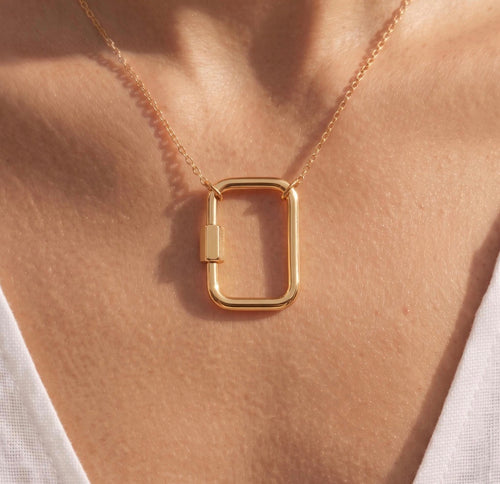 18k solid gold square carabiner charm holder in yellow gold, screw clasp necklace connector, on model

