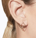 18k solid gold diamond 3D cube earring close-up detail, pavé diamond pavé setting, latch back closure

