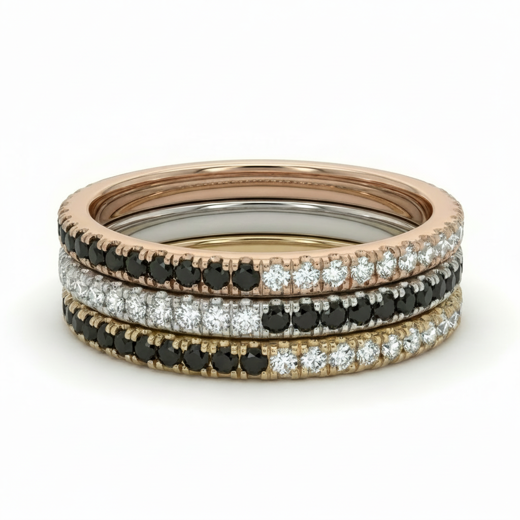 14k solid gold ring stack -  eternity rings in rose gold, yellow gold, and white gold, featuring rows of black diamonds and clear diamonds, designer jewelry