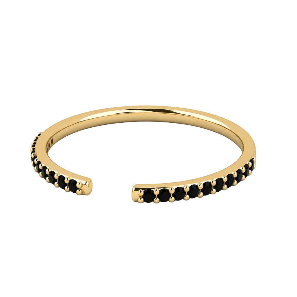Flat view of a yellow gold black pavé diamond open stack ring, showing the gap and diamond-set shoulders.
