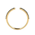 Front view of a yellow gold black pavé diamond open stack ring, showing the gap and diamond-set shoulders.
