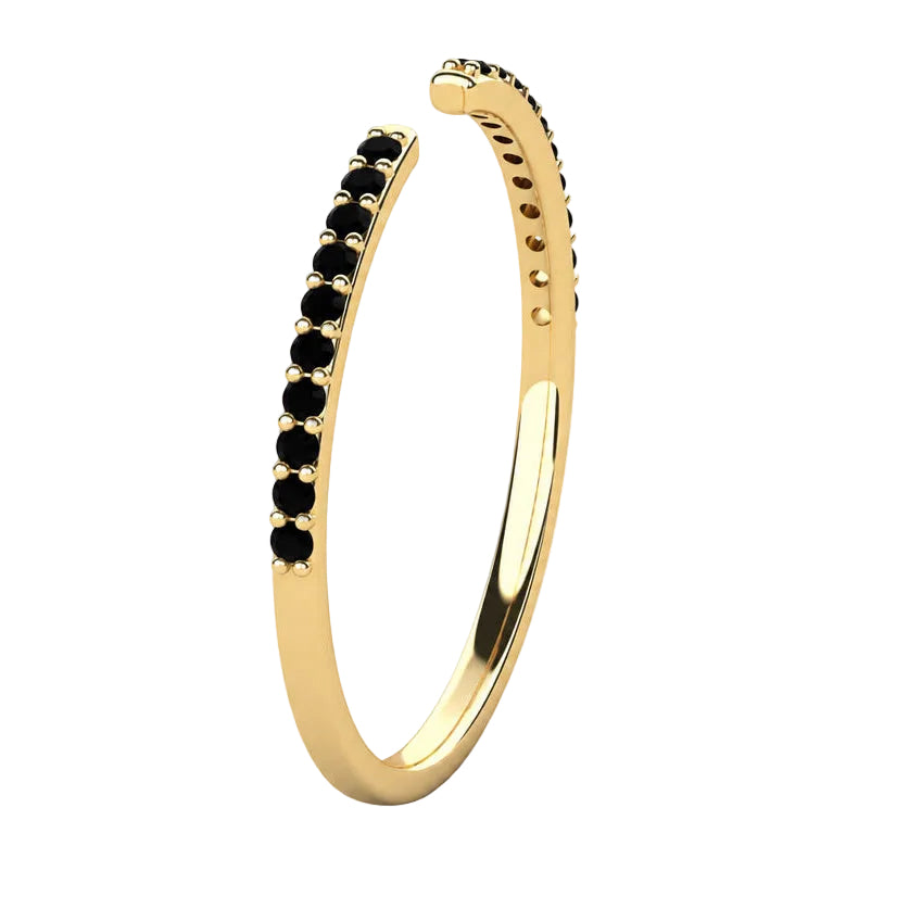 Side Angle view of a yellow gold black pavé diamond open stack ring, showing the gap and diamond-set shoulders.
